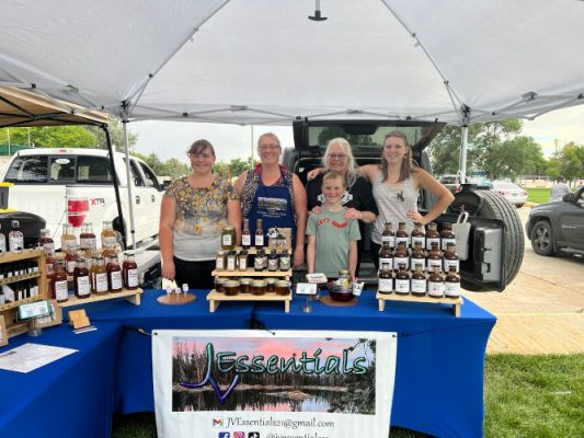 Jen Smith and family at the JVEssentials market booth